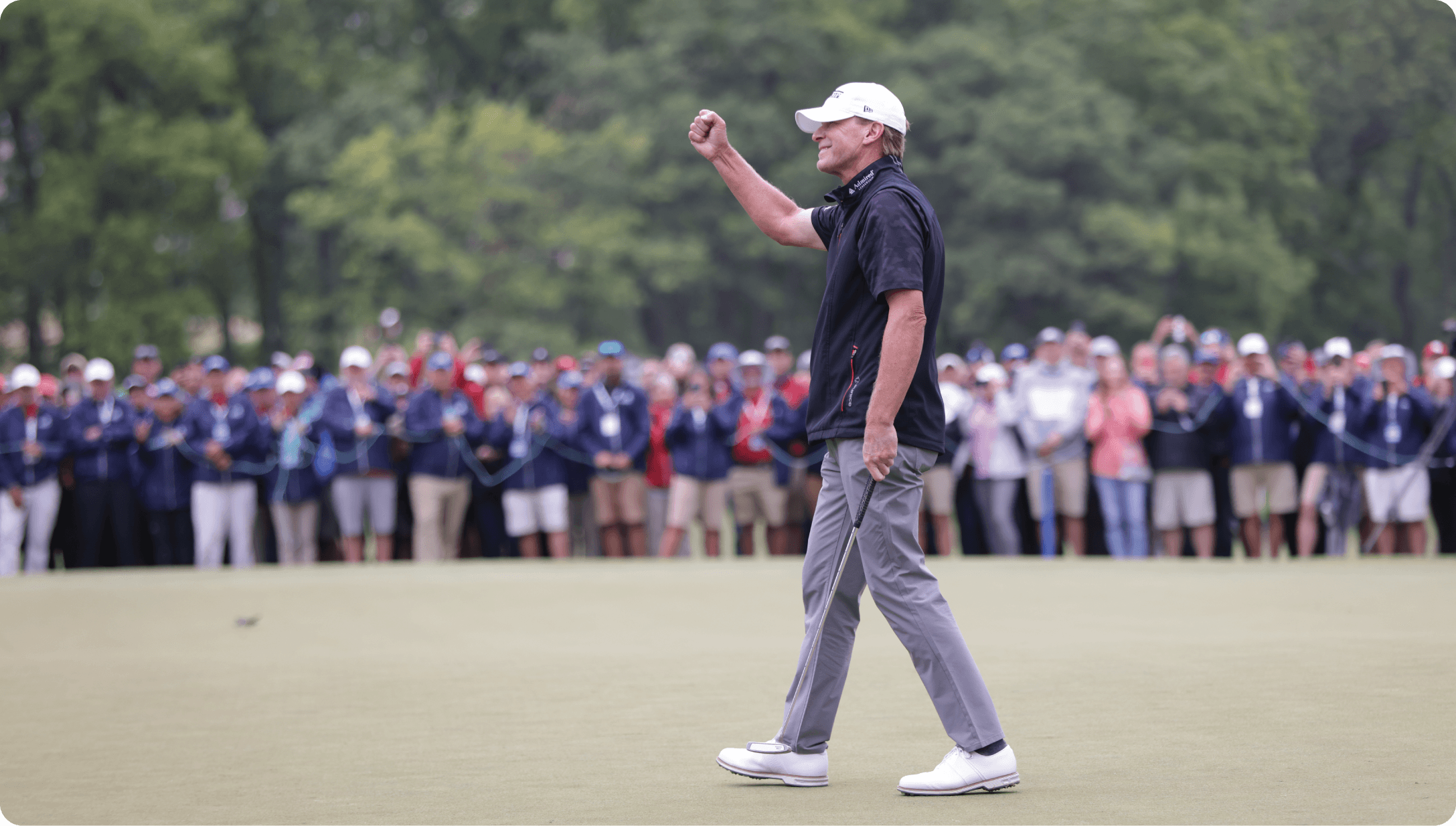 a man in a golf uniform