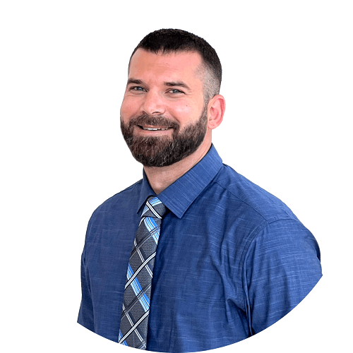 a man with a beard and a blue shirt