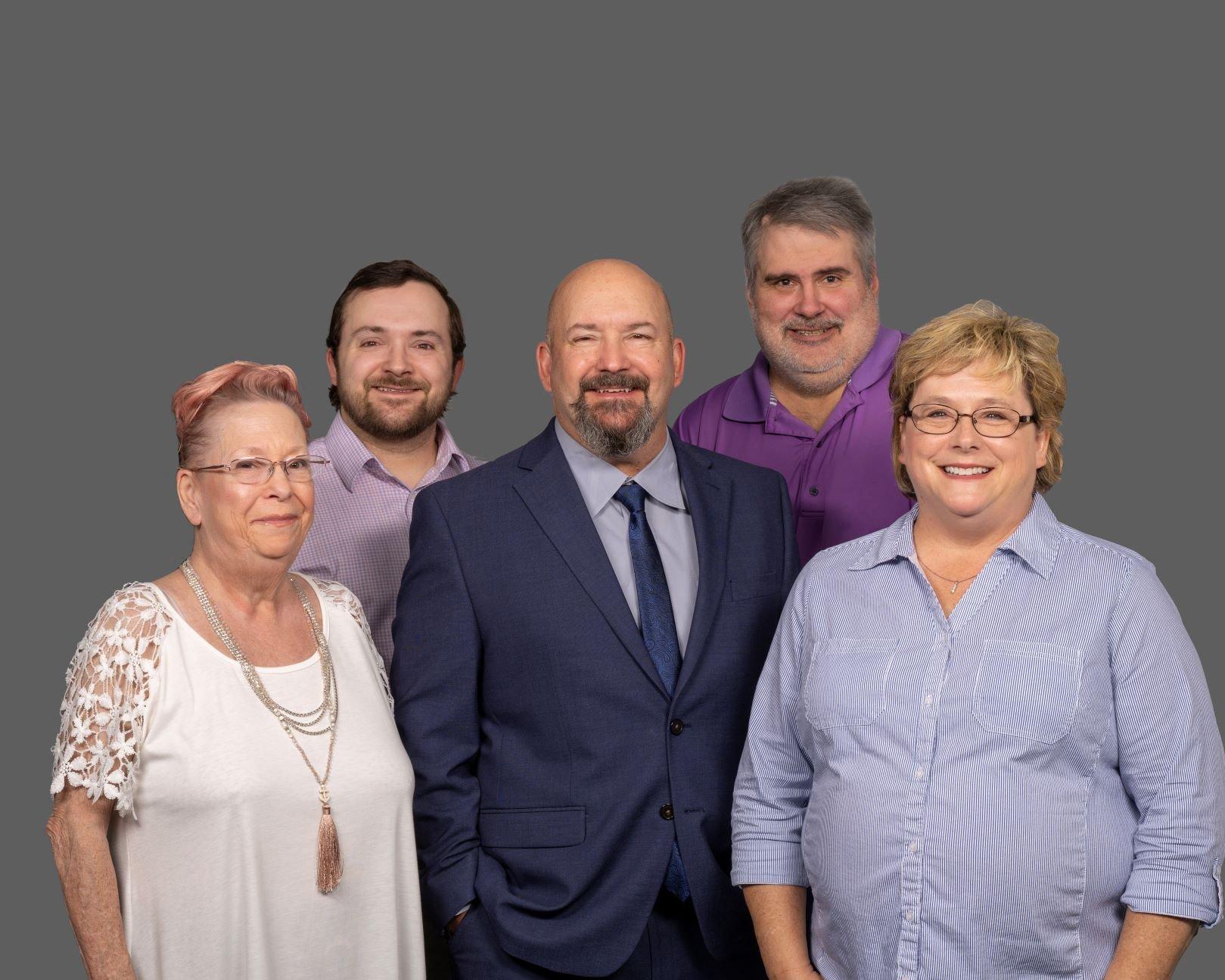 a group of people posing for a photo