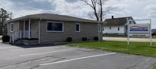 a house with a sign in front