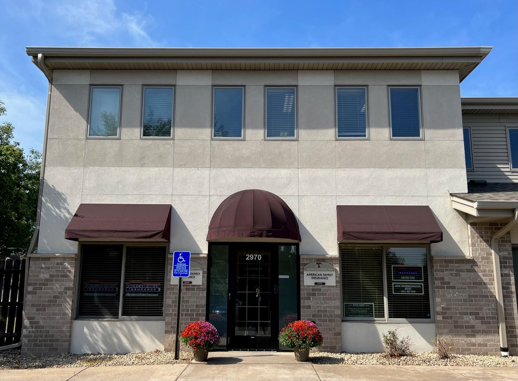 a building with a sign in front