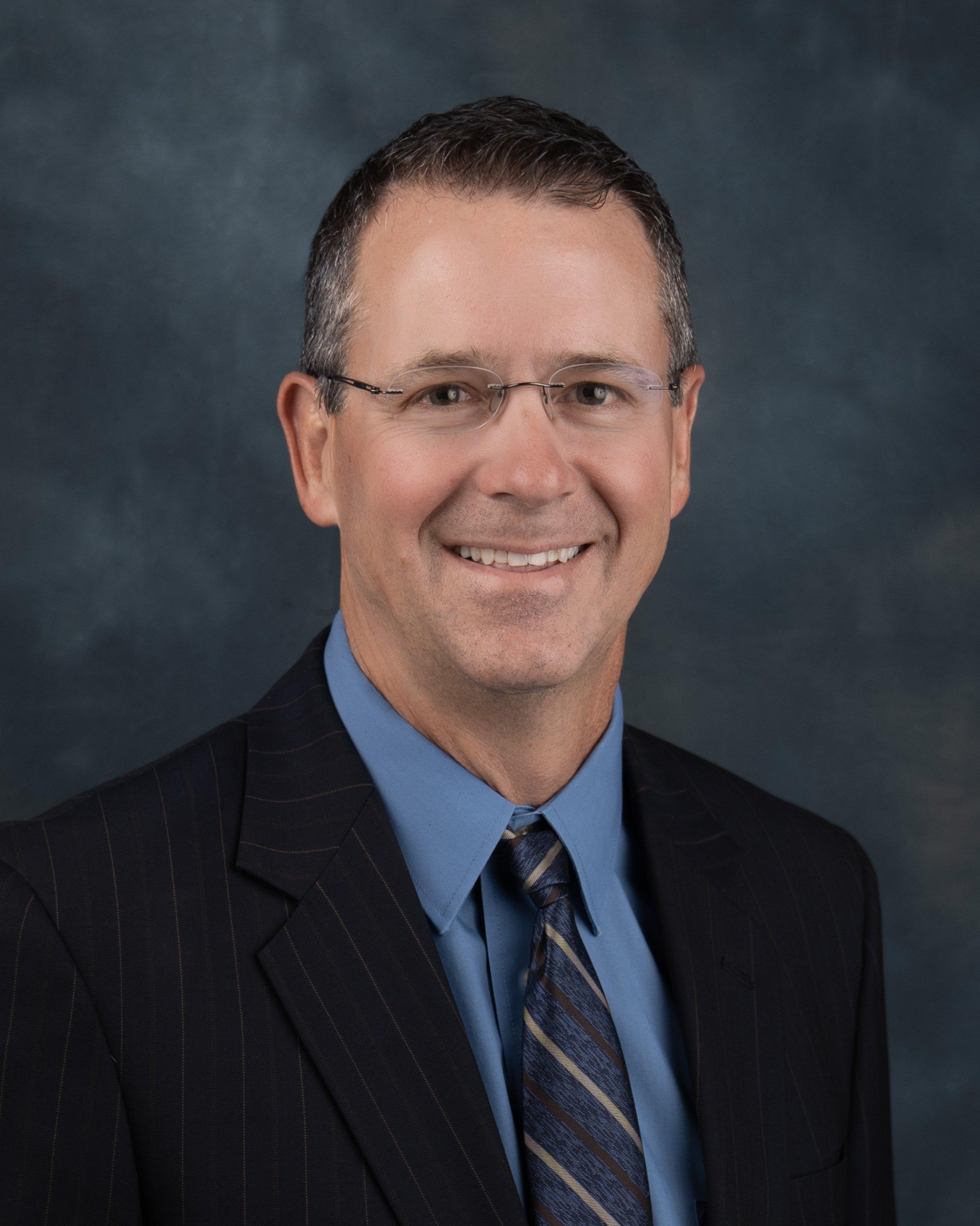 a man wearing a suit and tie