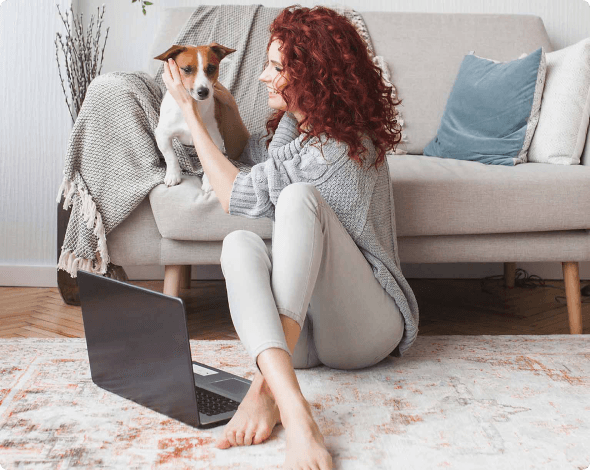 Woman with her pet dog at home