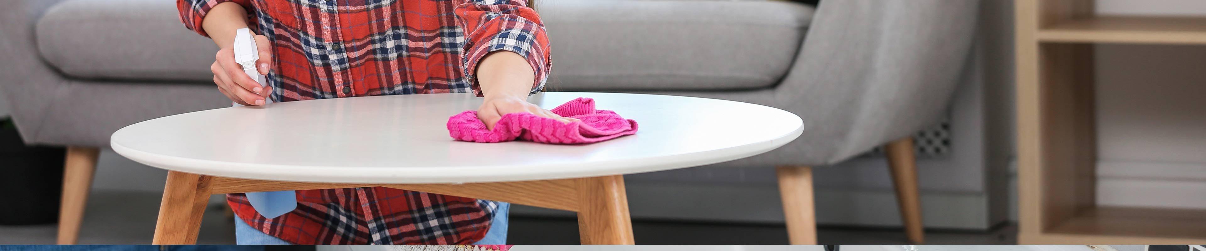 Image of a housekeeper cleaning a home.