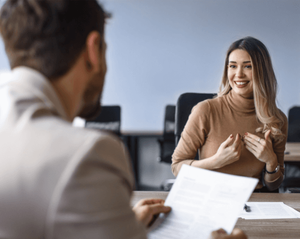 Man interviewing a woman